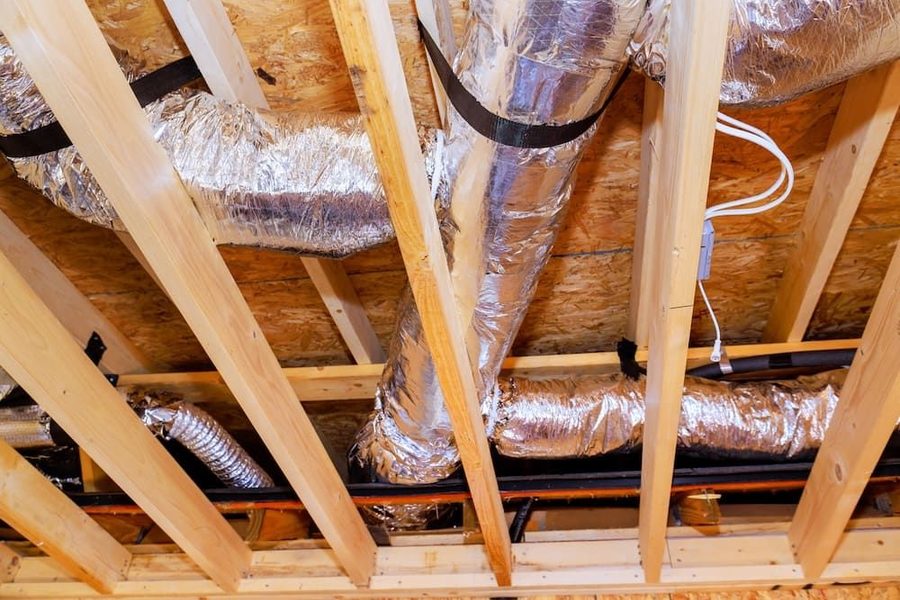 Sealed air ducts in a home's attic to ensure proper airflow from AC system.